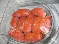 Sprinkle with ground red paprika, salt and place...