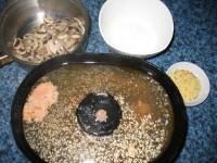 Place steamed mushrooms into the saucepan and pour...