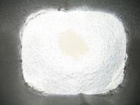 Pour water in the baking container for bread, add...
