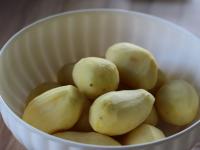 Peel the potatoes and wash them. Put aside one...