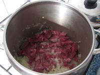 Wash the meat and cut it into cubes. Add it to the...