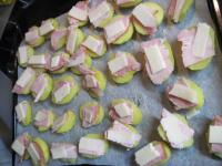 Put potatoes on a baking sheet lined with baking...