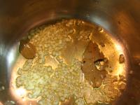 Roast garlic and bay leaf in oil for a few...