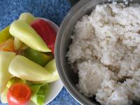 Cook the rice and let it cool. Wash the peppers,...