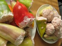 Gently press the mixture into prepared peppers....