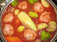 Carefully drop stuffed pepper and prepared balls...
