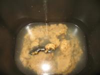 Pour water into the container for kneading and...
