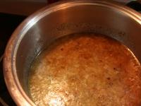 In a saucepan, mix onion, beef broth, wine, thyme,...