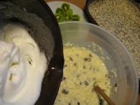Beat butter with sugar, stir egg yolks in. Add...