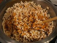 Remove mixture from the heat and pour puffed rice...