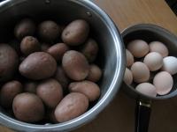 Cook unpeeled salad potatoes. After it is cooled,...