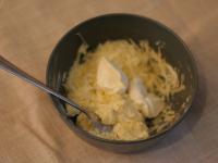 Add grated cheese to the mixture. ...