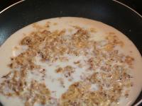 Pour over with milk, stir and let it heat....