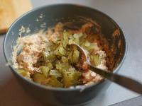 Add in the spread sterilized sour cucumber chopped...