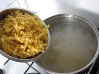 Cook pasta in salted water. Strain it and put it...