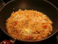our water if necessary and cook until the rice is...