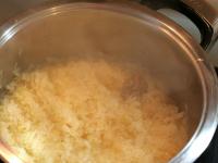 Drain white sauerkraut and cut it into thirds so...