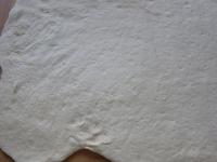 When do dough has risen enough, flour the board...