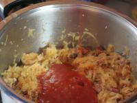 Add tomato paste and lard. Season with a cabbage...