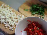 Wash peppers, clean and cut it into small pieces....