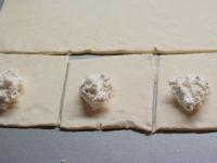 Use a rolling pin to spread the puff pastry until...