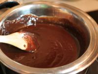 Separately chop both chocolates. Melt each of them...