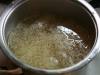 Finely grate the celery, pour it over with boiling...
