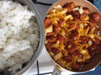Rinse the rice under running water, fry dry in a...