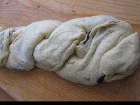 Carefully bring one stuffed dough over the other...