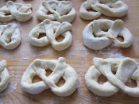 Form pretzel from each rope and let it rest for a...