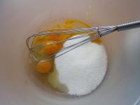 Beat whole eggs with sugar, add oil and water and...