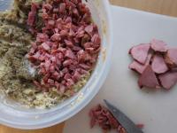 Cut cooked smoked meat into cubes, add it to...