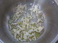 Peel an onion, chop finely and cook in oil....