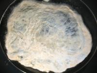 In a saucepan, heat oil, stretch each loaf out...