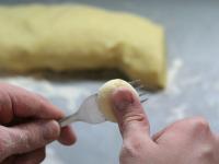 Make balls from the dough in your hands, flatten...