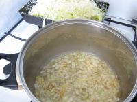 Peel and chop the onion. In deep saucepan heat the...