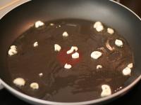 Fry chopped garlic in a pan....