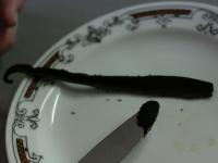 Cut vanilla pod lengthwise and scrape the inner...
