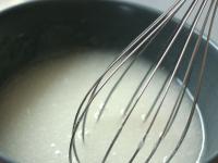 Prepare the gelatin in a smaller bowl according to...