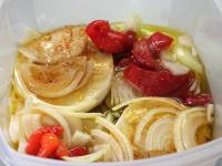 Pour olive oil mixed with spices, close the...