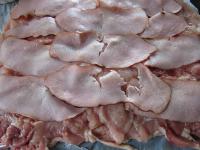 Spread slices of ham or smoked meat on a slice of...