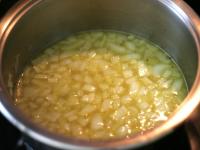 Pour the stock over the mixture in a saucepan....