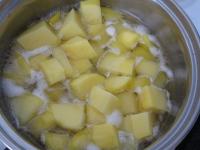 Peel potatoes, cut them and cook in the adequate...