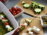 Cut feta cheese into cubes and zucchini into...