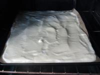 Pour dough into the tray covered with baking paper...