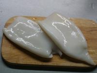 Wash full-dressed calamari in clean water. ...