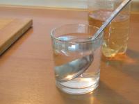Add vinegar into the warm water and mix it....