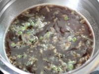 Pour ketchup, soy sauce, pressed garlic into the...