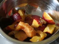 Add mixed fruit and whipped cream to the cream. ...