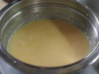 Whisk the mixture over a hot-water bath. Remove...
